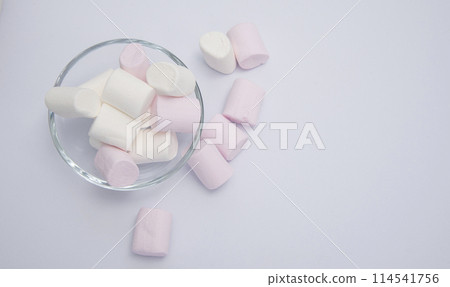 Fluffy white marshmallow macro isolated over white background. 114541756