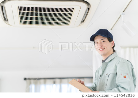Workers inspecting air conditioners Workers inspecting air conditioners 114542036