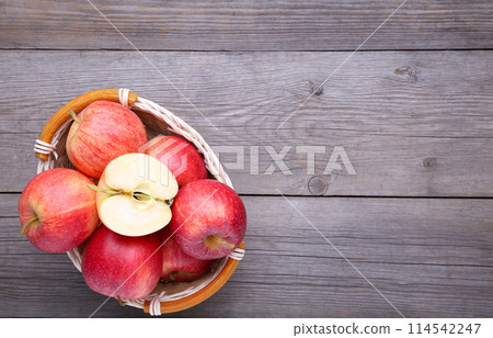 A red apples on a grey background 114542247