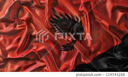 vibrant flag of Albania dances gracefully in the wind, showcasing its bold red background and distinctive black double-headed eagle symbol. 114543288