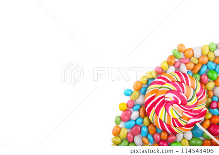 Colorful lollipops and different colored round candy isolated Colorful lollipops and different colored round candy isolated 114543406