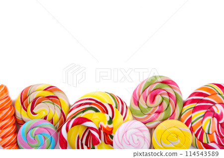 Colorful lollipops isolated on white background. Studio shot Colorful lollipops isolated on white background. Studio shot 114543589