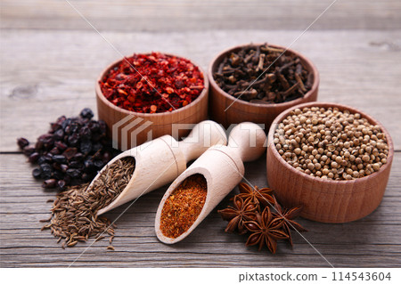 Spices mix on a grey wooden background. Top view 114543604