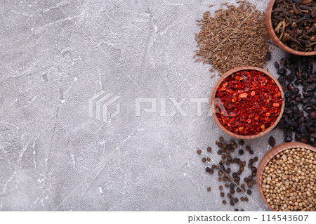 Spices mix on a grey background. Top view Spices mix on a grey background. Top view 114543607