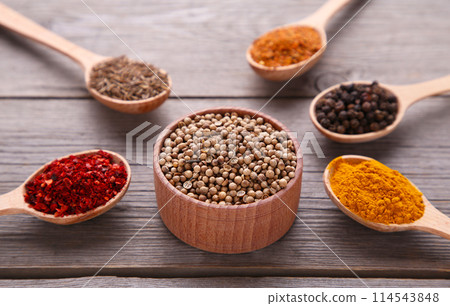Spices mix on a grey wooden background. Top view 114543848