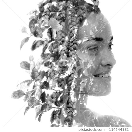 A black and white creative double exposure portrait of a smiling woman A black and white creative double exposure portrait of a smiling woman 114544581