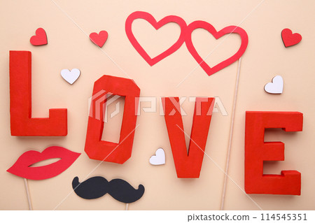 Photo booth colorful props for party on beige background 114545351