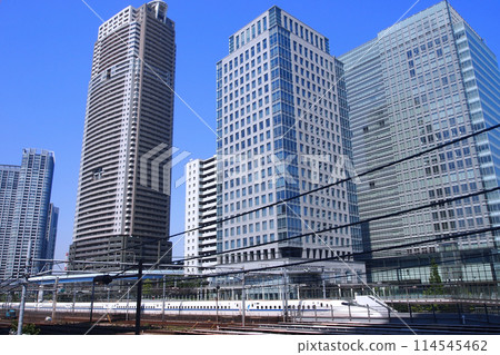 A Shinkansen train passing near Shiodome Shiosite and Hamamatsucho Station 114545462