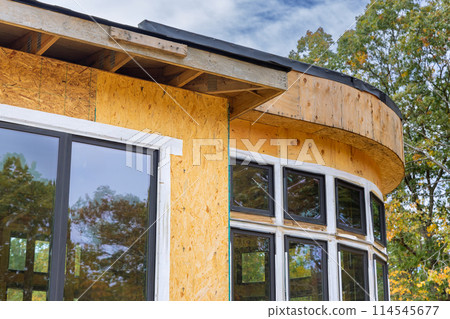 During construction of house, the joist framework has been installed, along with gutter holders soffit fascia trim. 114545677