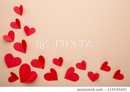 Valentines day greeting card. Handmaded red hearts on beige background. 114545941