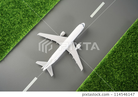 Airplane on the runway. Transportation and logistics. Planning trips and routes. Industry. Transport and deliver of cargoes. 114546147