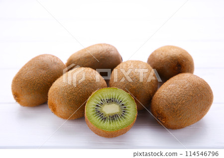 Fresh kiwi fruit on white wooden background 114546796