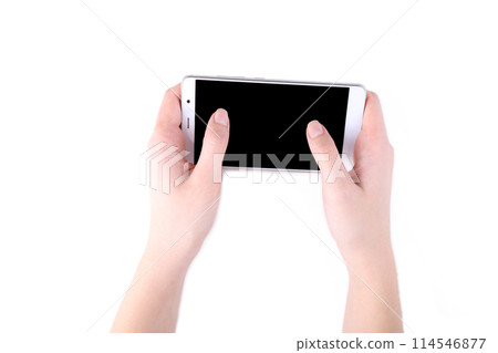 Female hands holding mobile phone with blank screen isolated on white 114546877