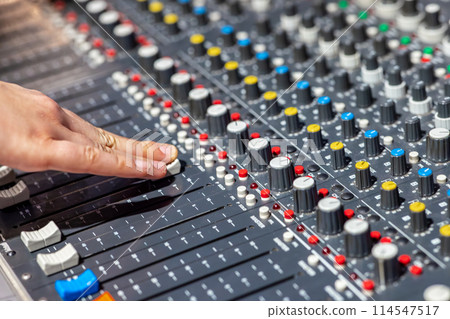 Closeup of audio mixer control panel 114547517