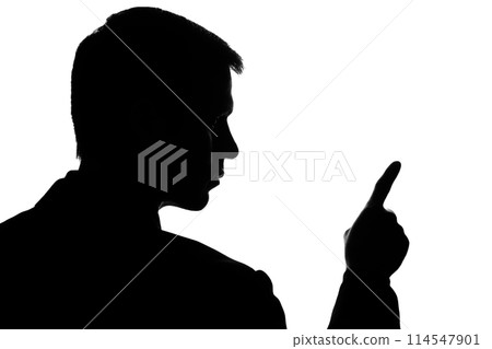 Young man in suit shows his index finger forward 114547901
