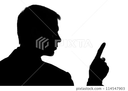 Young man in suit shows his index finger forward Young man in suit shows his index finger forward 114547903