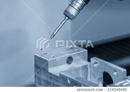 Closeup scene the multi-axis CMM machine measuring the aluminum automotive parts. Closeup scene the multi-axis CMM machine measuring the aluminum automotive parts. 114548490