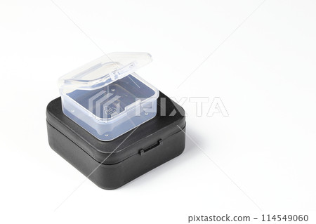Empty small transparent and black plastic box isolated on white background. Empty small transparent and black plastic box isolated on white background. 114549060