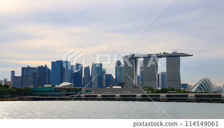 Singapore CBD city skyline view from Marina Barrage, with beautiful blue sky and white cloud. 114549061