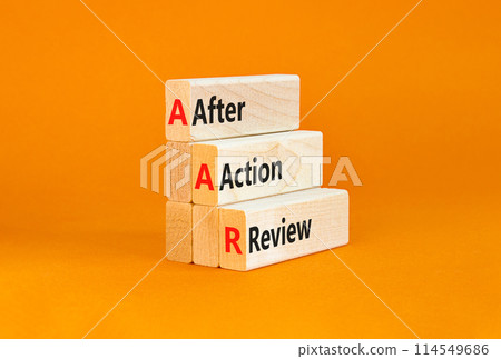 AAR After action review symbol. Concept words AAR After action review on beautiful wooden blocks. Beautiful orange background. Business AAR after action review concept. Copy space. AAR After action review symbol. Concept words AAR After action review on beautiful wooden blocks. Beautiful orange background. Business AAR after action review concept. Copy space. 114549686