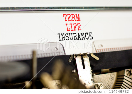 Term life insurance symbol. Concept words Term life insurance typed on beautiful old retro typewriter. Beautiful white paper background. Medical term life insurance concept. Copy space. 114549782