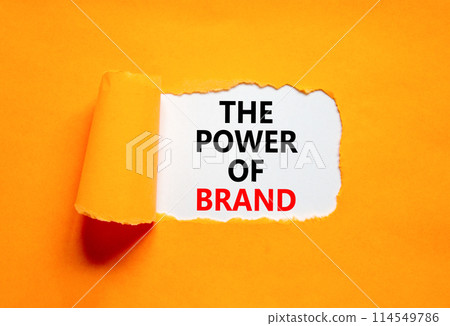 The power of brand symbol. Concept words The power of brand on beautiful white paper. Beautiful orange background. Business the power of brand concept. Copy space. 114549786