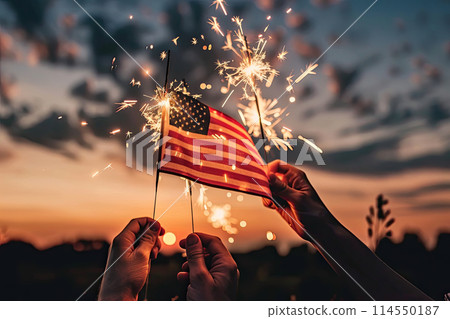 hands waving american flags for the 4th of july 114550187