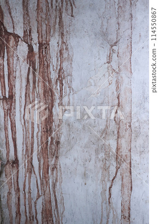 Dirt running down an old dirty wall 114550867