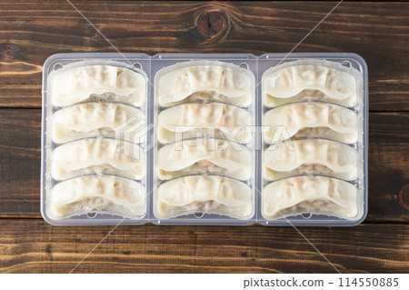Frozen Gyoza in a wooden bag 114550885