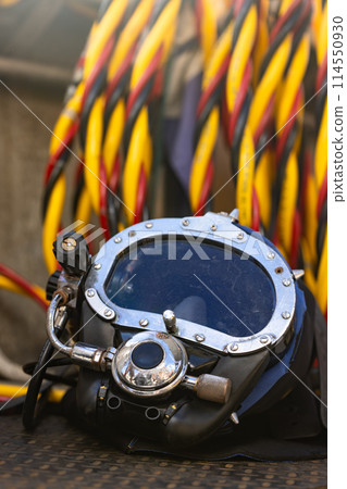 Closeup of commercial diving helmet on the boat Closeup of commercial diving helmet on the boat 114550930