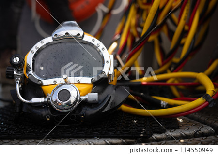Closeup photo of commercial diving helmet 114550949