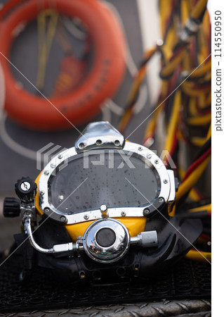 Closeup photo of commercial diving helmet 114550950