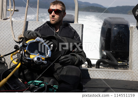 Closeup of commercial diver in helmet 114551159