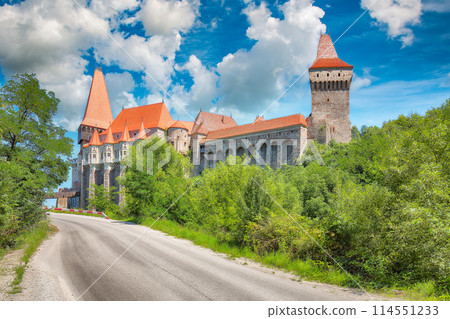 Captivating morning view of Hunyad Castle / Corvin's Castle with wooden bridge. Captivating morning view of Hunyad Castle / Corvin's Castle with wooden bridge. 114551233