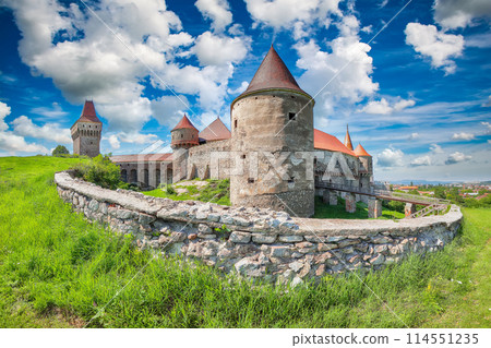 Captivating morning view of Hunyad Castle / Corvin's Castle with wooden bridge. 114551235