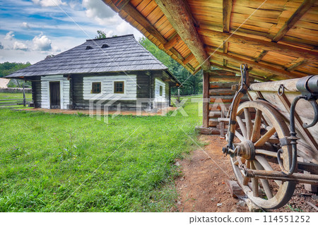 Amazing summer scene of traditional romanian peasant houses. Amazing summer scene of traditional romanian peasant houses. 114551252
