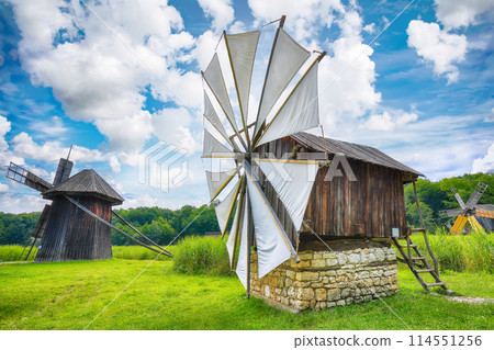 Amazing summer view of traditional romanian windmill. Amazing summer view of traditional romanian windmill. 114551256