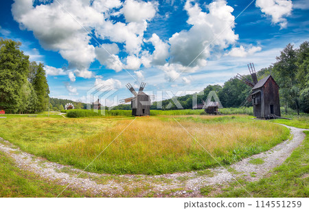 Amazing summer view of traditional romanian windmill. Amazing summer view of traditional romanian windmill. 114551259