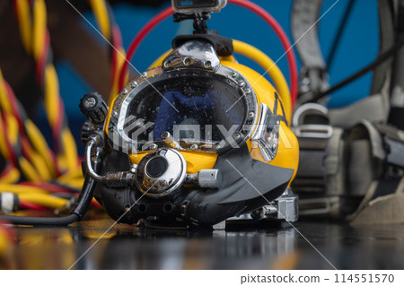 Closeup photo of commercial diving helmet 114551570