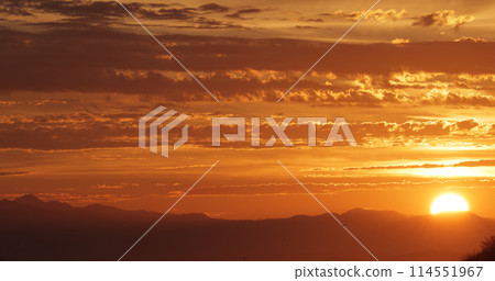 Sunset over British Columbia mountains at sea Sunset over British Columbia mountains at sea 114551967