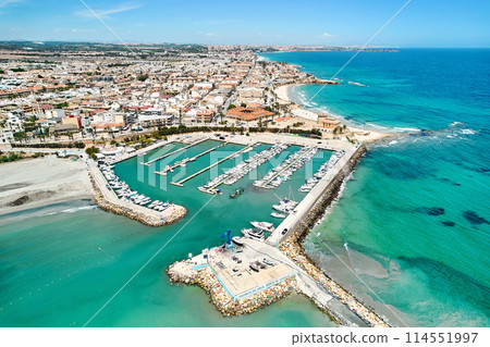 Aerial shot, Torre de la Horadada harbor and townscape. Costa Blanca, Spain Aerial shot, Torre de la Horadada harbor and townscape. Costa Blanca, Spain 114551997
