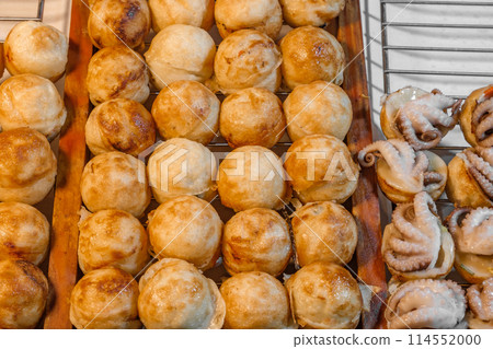 cooked takoyaki grilling, octopuses, snack street food, selective focus cooked takoyaki grilling, octopuses, snack street food, selective focus 114552000