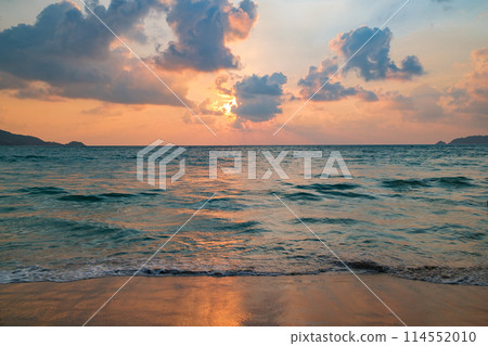 sunset over sea and sun rays in clouds, sandy beach, Thailand sunset over sea and sun rays in clouds, sandy beach, Thailand 114552010