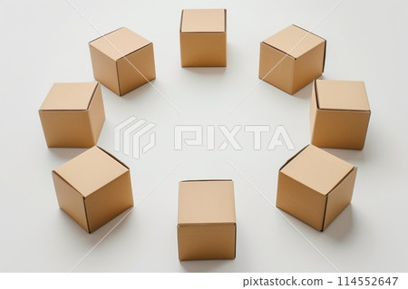 Uniform cardboard boxes arranged in a circular pattern on a clean white surface 114552647