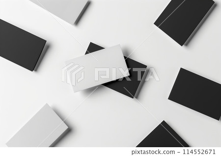 Collection of blank business cards in black and white spread on a clean surface for branding 114552671