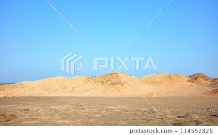 Egypt desert landscape with a blue sky. Egypt desert landscape with a blue sky. 114552828