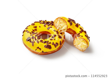 Fluffy donuts with tropic fruit flavored buttercream and yellow icing Fluffy donuts with tropic fruit flavored buttercream and yellow icing 114552923