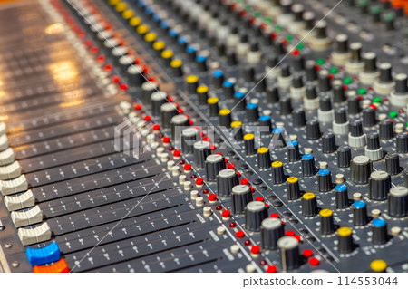 Closeup of audio mixer control panel Closeup of audio mixer control panel 114553044