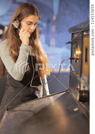 Woman operating in vintage call center Woman operating in vintage call center 114553059