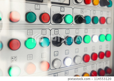 Old control panel with glowing buttons Old control panel with glowing buttons 114553120
